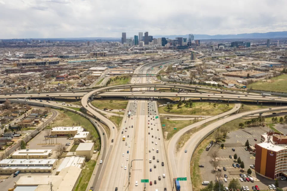 Aerial view of downtown Denver, Colorado with freeway in foreground